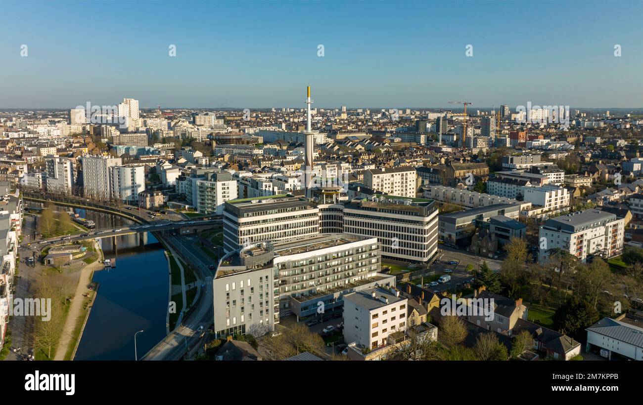 Rennes (Brittany, north-western France): aerial view of the River Vilaine and the tower block “tour Mabilais” in the District of Arsenal Redon, former Stock Photo