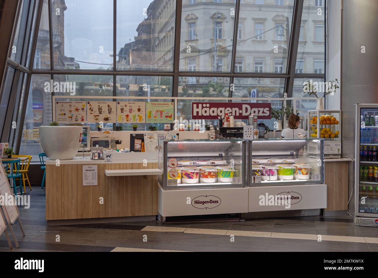 Budapest, Hungary - July 31, 2022: Ice Cream Stand Haagen Dazs at Entrance to Westend Shopping Mall. Stock Photo