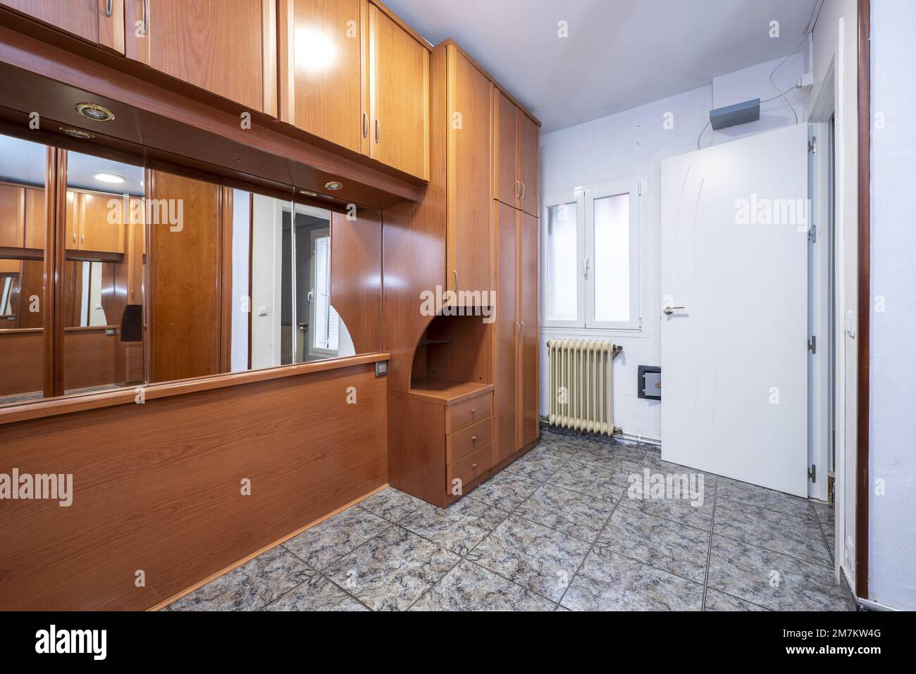 Bedroom without bed with bridge furniture on the mezzanine and builtin