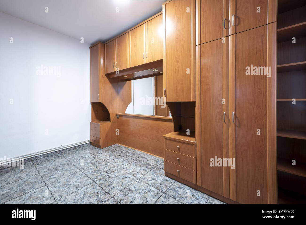 Bedroom without bed with bridge furniture on the mezzanine and builtin