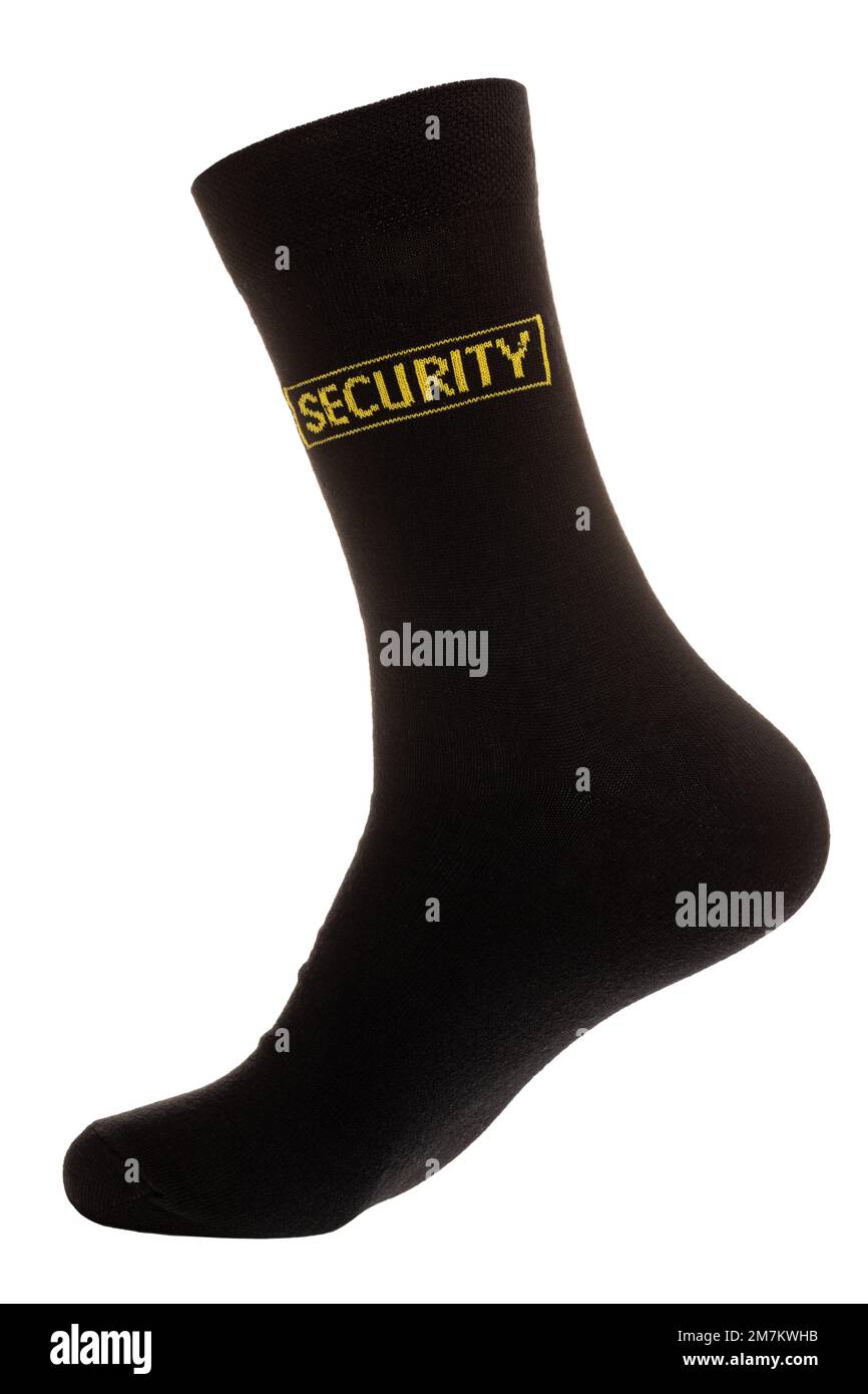 Long black sock uniform of the security guard with label inscription on foot mannequin isolated on a white background Stock Photo