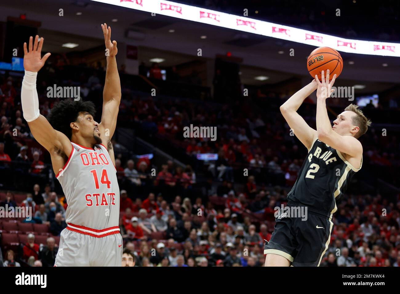 Purdue guard Fletcher Loyer, right, shoots in front of Ohio State