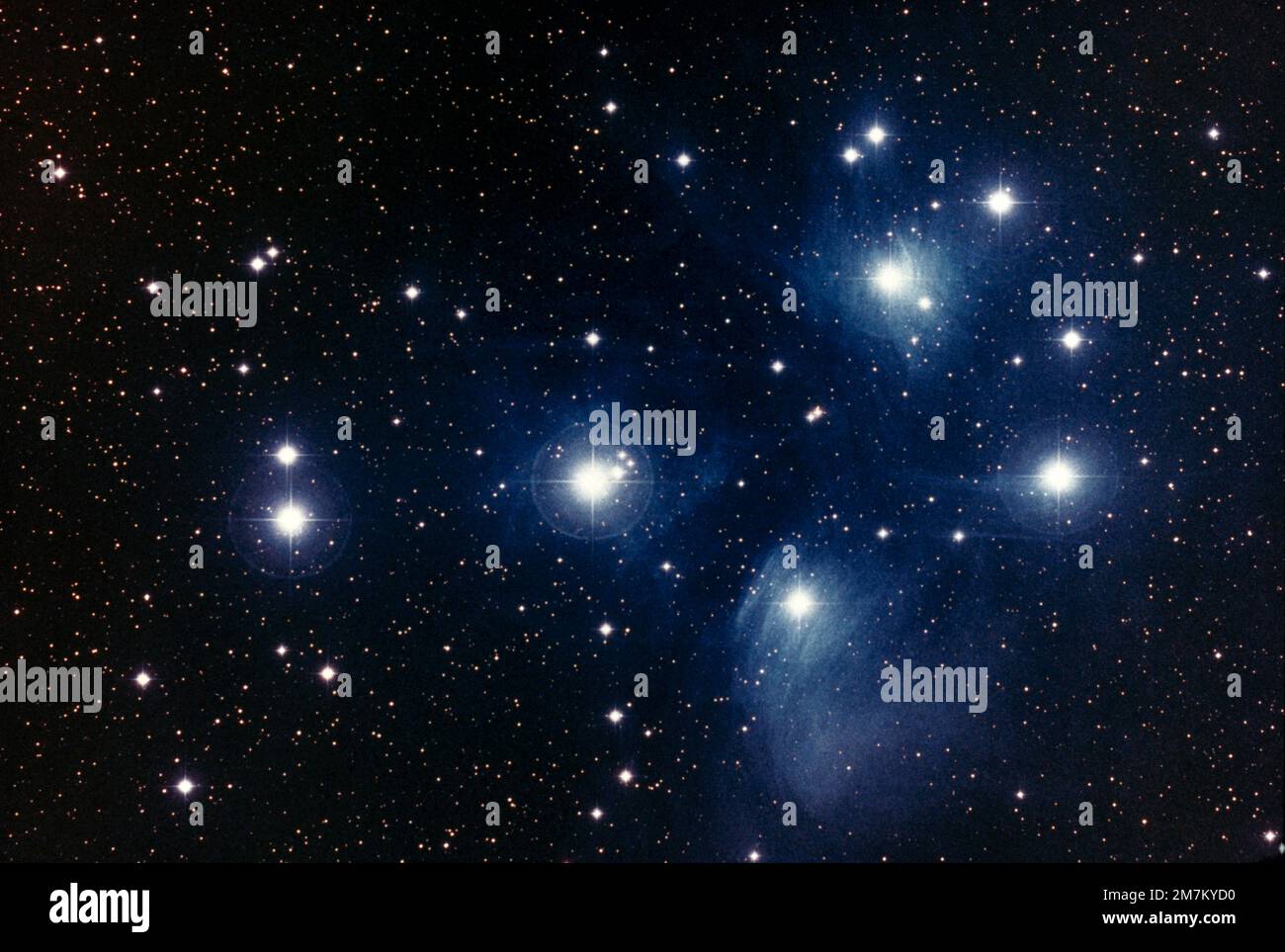 The Pleiades In Taurus Constellation an Open Star Cluster Stock Photo