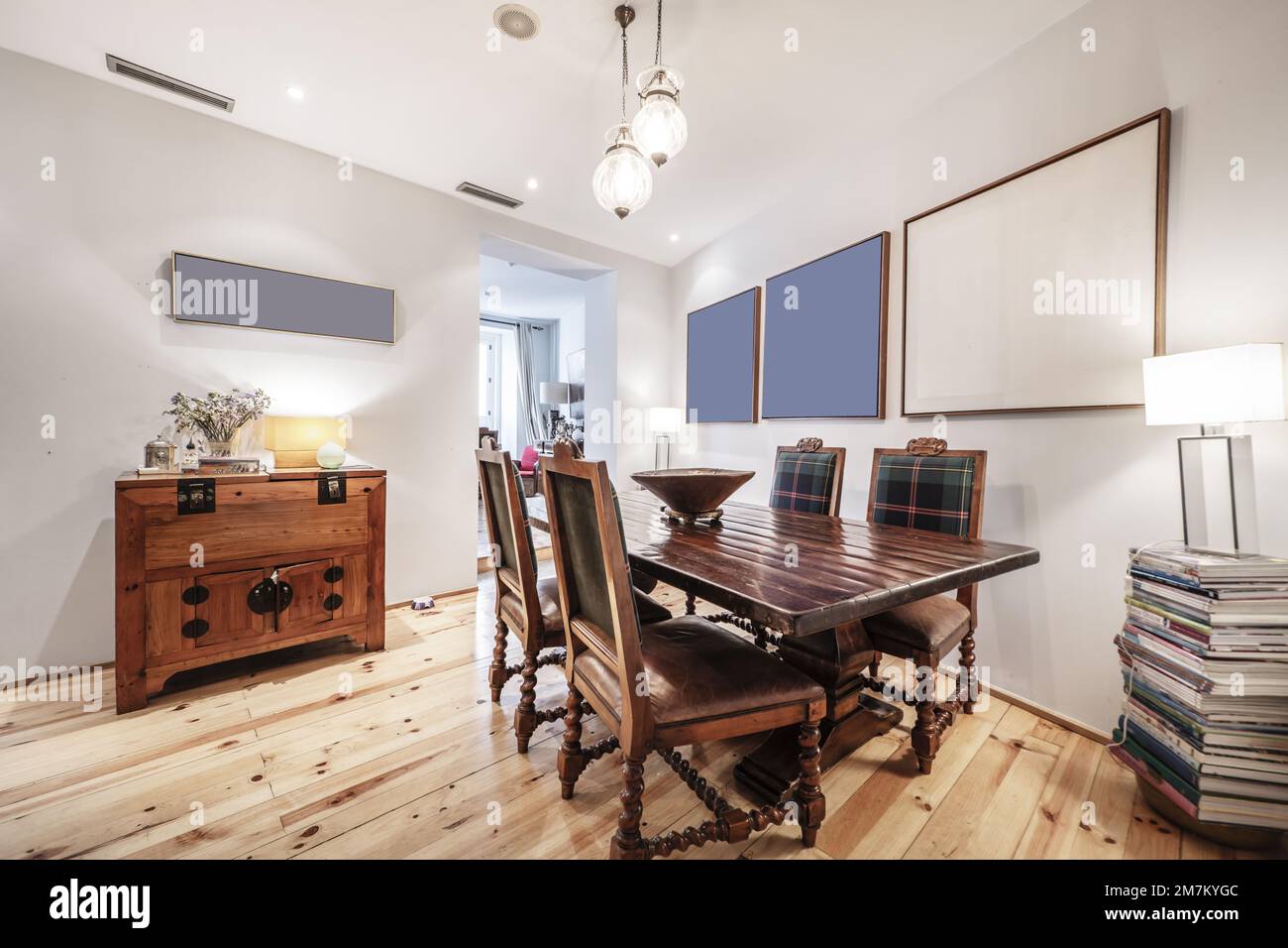 Living room with hardwood dining table with matching vintage wooden