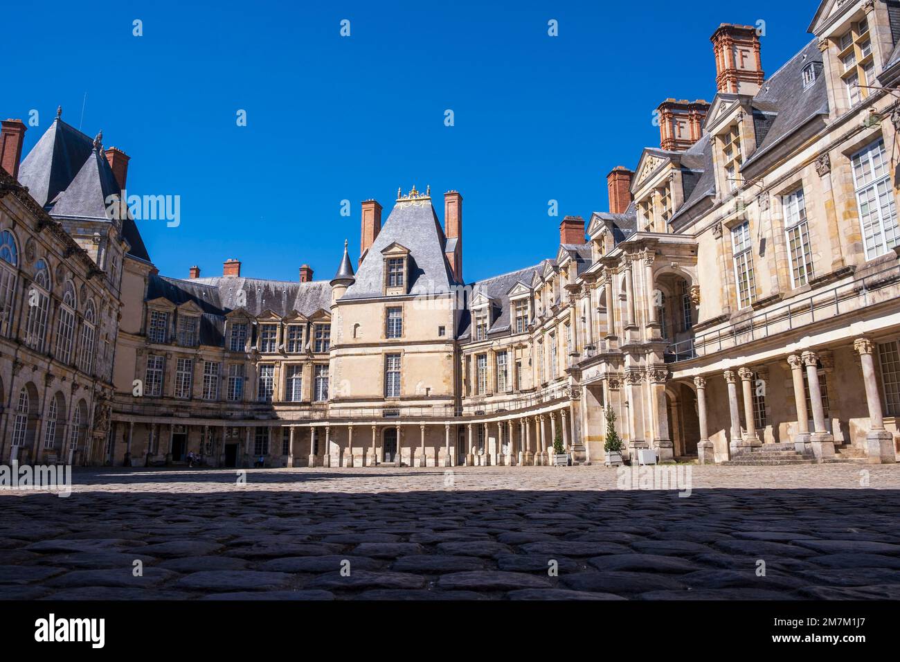 Fontainebleau (Paris area): the Oval Courtyard and the square tower of the donjon Stock Photo