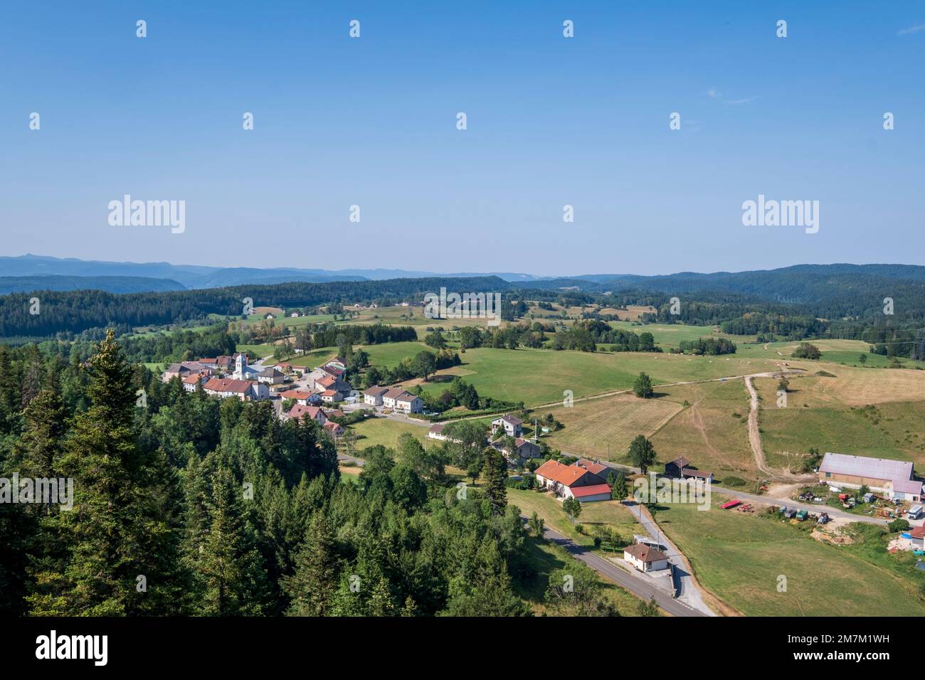 Grande-Riviere Chateau, Chateau-des-Pres (central-eastern France): panoramic view of the countryside, the village, the upper part of the Jura departme Stock Photo