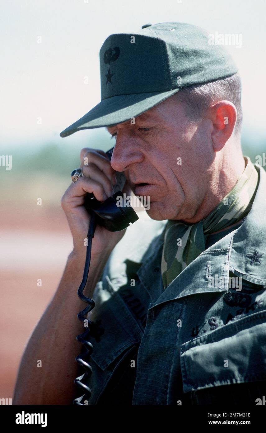 BGEN Stan McClellan, U.S. Army, CHIEF of STAFF, Military Assistance Command - Vietman (MACV), talks on the radio during the pending exchange of American and South Vietnamese prisoners for Viet Cong (VC) and North Vietnamese (NVA) prisoners with Viet Cong officer. Subject Operation/Series: HOMECOMING Base: Travis Air Force Base State: California (CA) Country: United States Of America (USA) Stock Photo