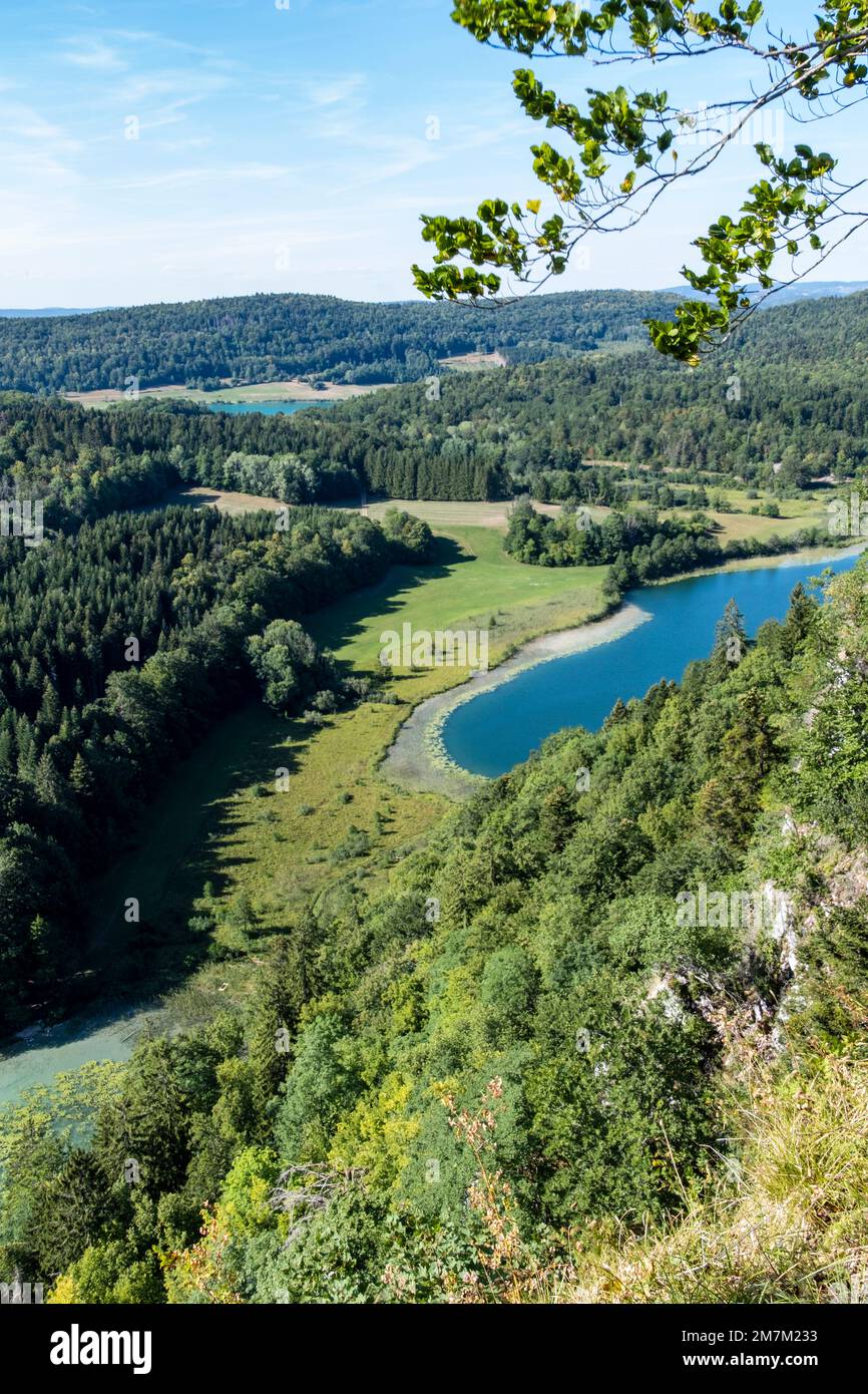 La ChauxduDombief (centraleastern France) Lake Petit Maclu viewed from the path leading to La ChauxduDombief (centraleastern France) Lake Petit Maclu viewed from the path leading to