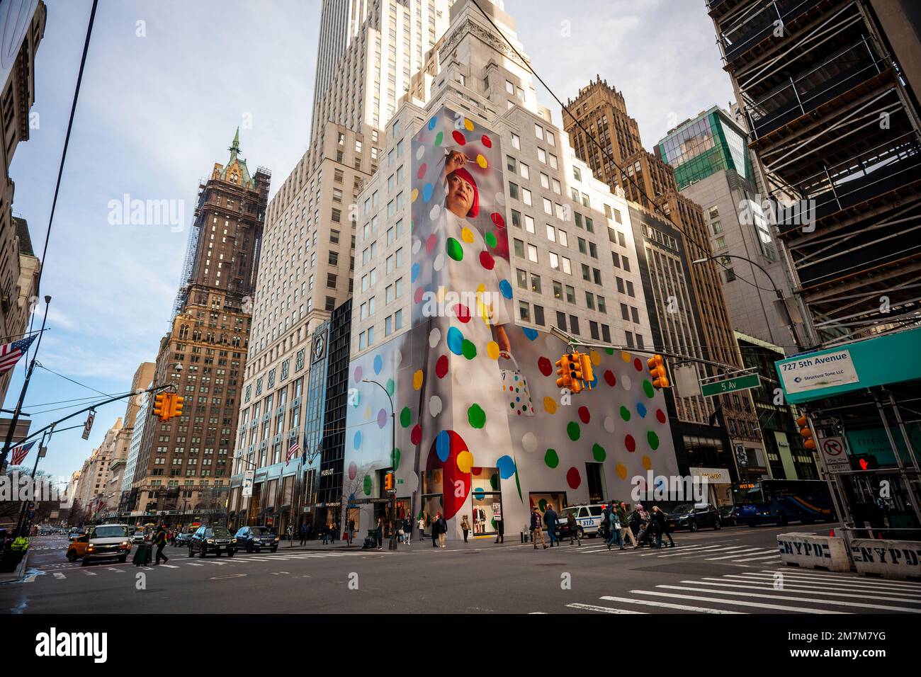 Yayoi Kusama's giant sculpture looks over Louis Vuitton's Paris store