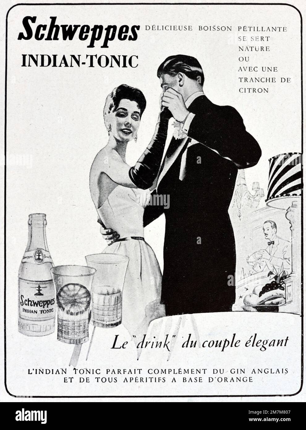 Vintage or Old Advert, Advertisement, Publicity or Illustration for Schweppes Indian Tonic Advert 1956 with Elegant Young Couple in Formal Dress Dancing or 1950s Fashion Stock Photo