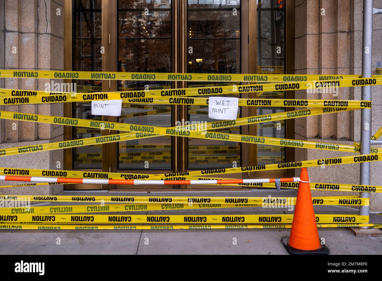Caution tape prevents passer-by from being attacked by wet paint in the Tribeca neighborhood of New York on Saturday, January 7, 2023. (© Richard B. Levine) Stock Photo