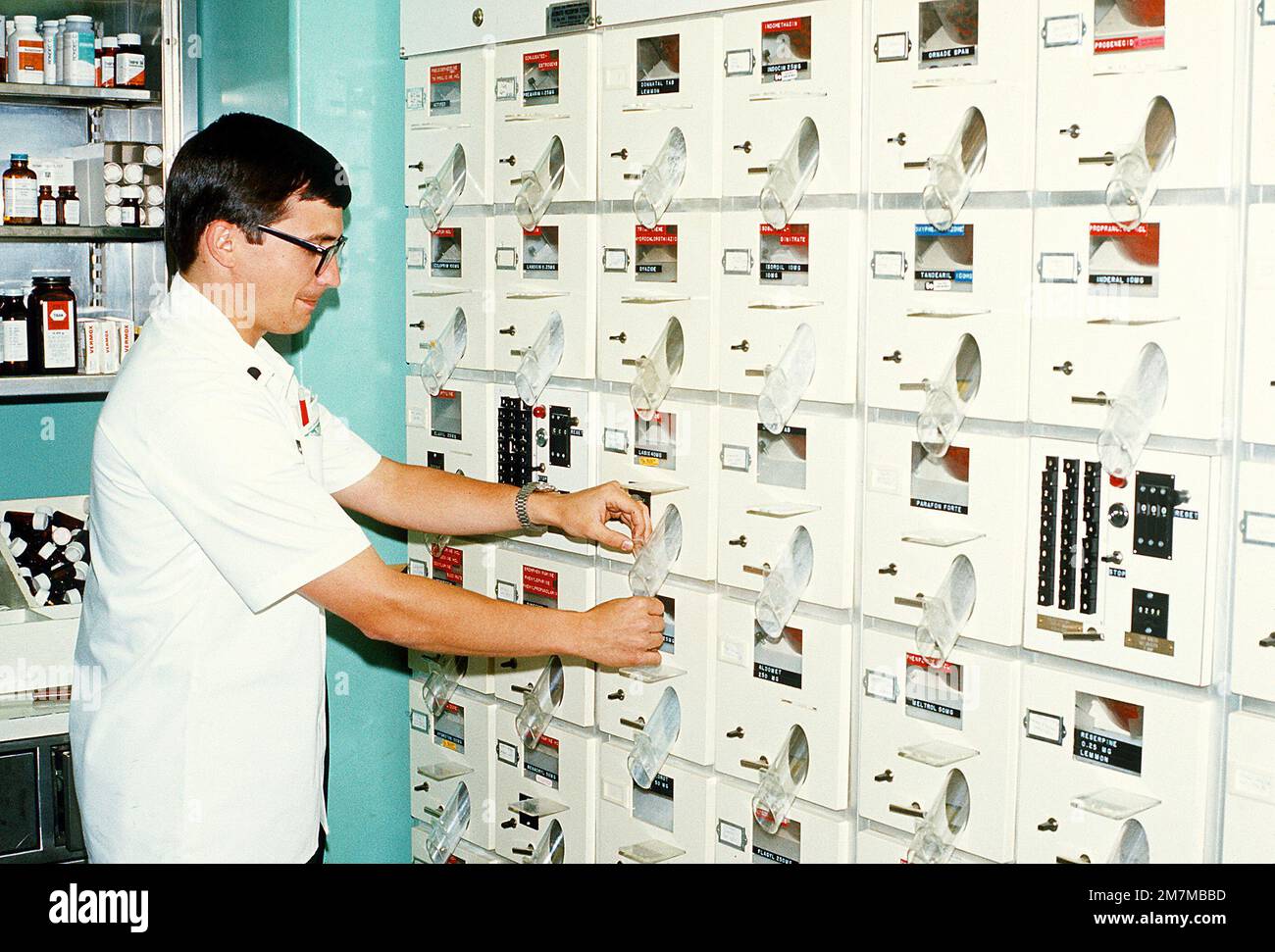 SPEC. 4 Paul Hartmann, a pharmacy technician, fills a prescription