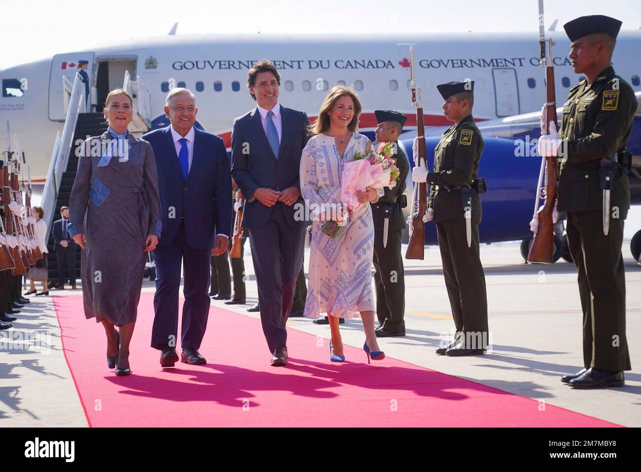 Mexico City, Mexico. 10th Jan, 2023. Canadian Prime Minister Justin Trudeau, center, and his wife Sophie Grégoire, right, are escorted by Mexican President Andres Manuel Lopez Obrador and wife Beatriz Gutiérrez Mülleron on arrival at Felipe Angeles International Airport, January 9, 2023 in Santa Lucia, Mexico. Biden is in Mexico to attend the North American Leaders Summit. Credit: Presidencia de la Republica Mexicana/Mexican Presidents Office/Alamy Live News Stock Photo