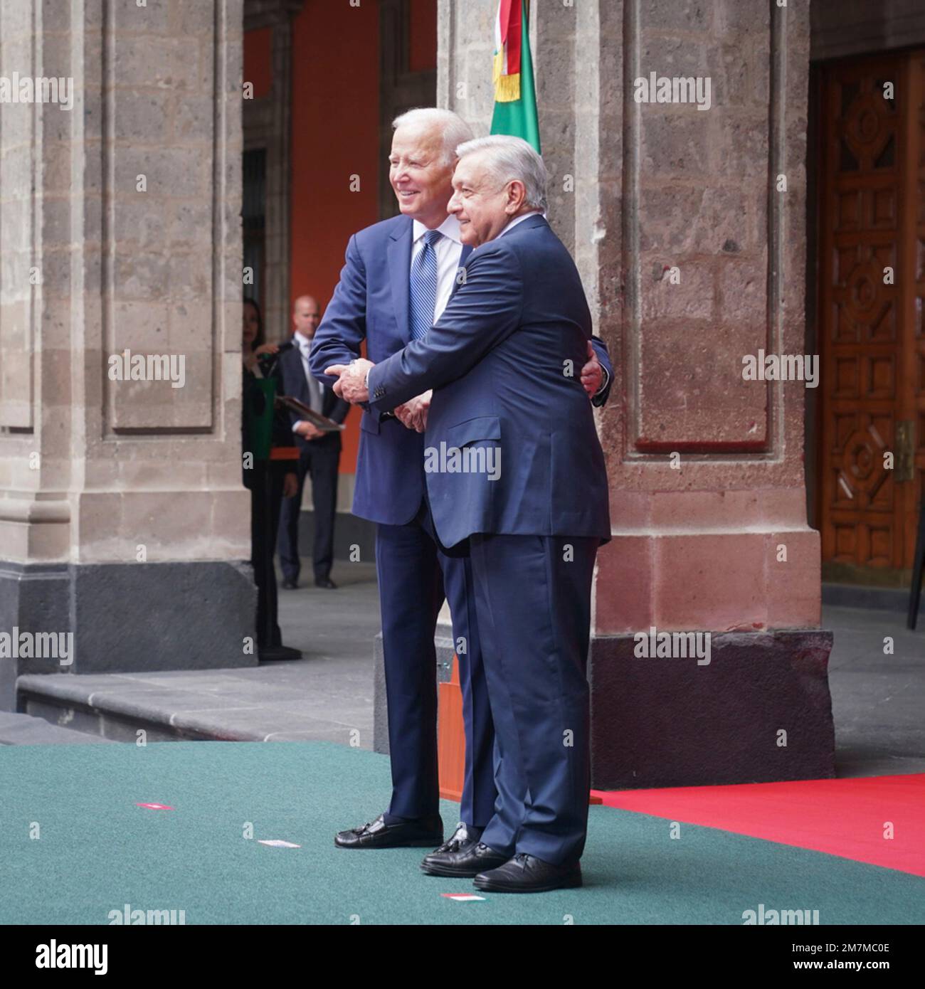 Mexico City, Mexico. 09th Jan, 2023. U.S President Joe Biden, left, and Mexican President Andres Manuel Lopez Obrador embrace during the arrival ceremony before the North American Leaders Summit at the Palacio Nacional, January 9, 2023 in Mexico City, Mexico. Credit: Presidencia de la Republica Mexicana/Mexican Presidents Office/Alamy Live News Stock Photo