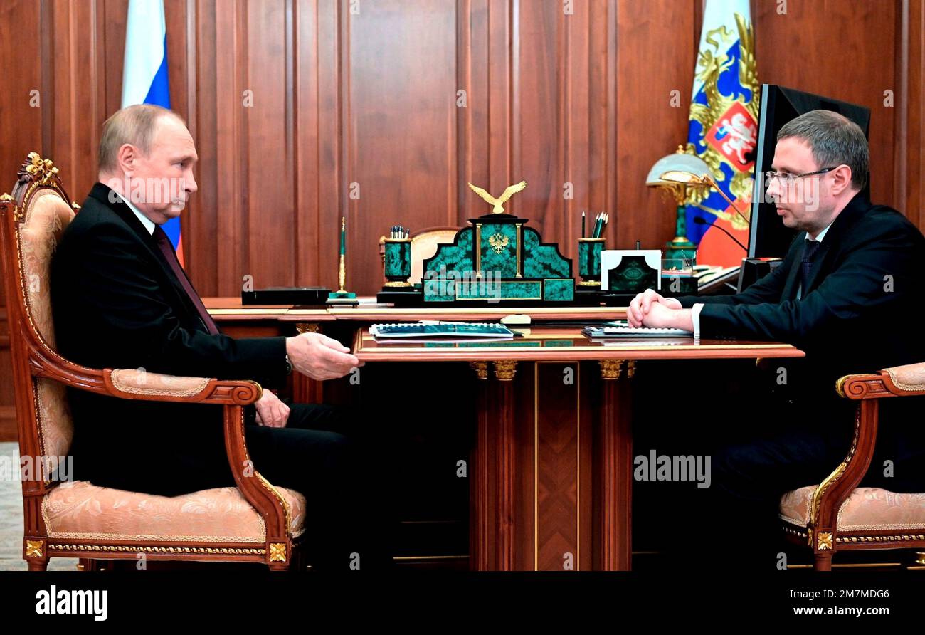 Moscow, Russia. 10th Jan, 2023. Russian President Vladimir Putin holds a face-to-face meeting with Federal Anti-Monopoly Service head Maxim Shaskolsky, right, at the Kremlin office, January 10, 2023 in Moscow, Russia. Credit: Mikhail Klimentyev/Kremlin Pool/Alamy Live News Stock Photo