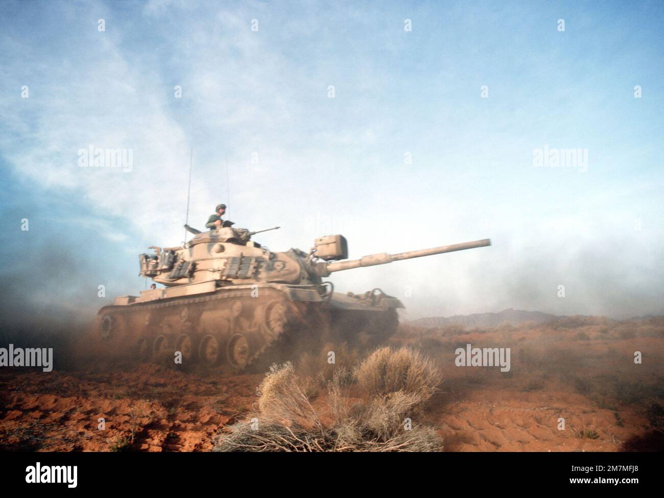 An M60 main battle tank moves out during a combat training exercise ...