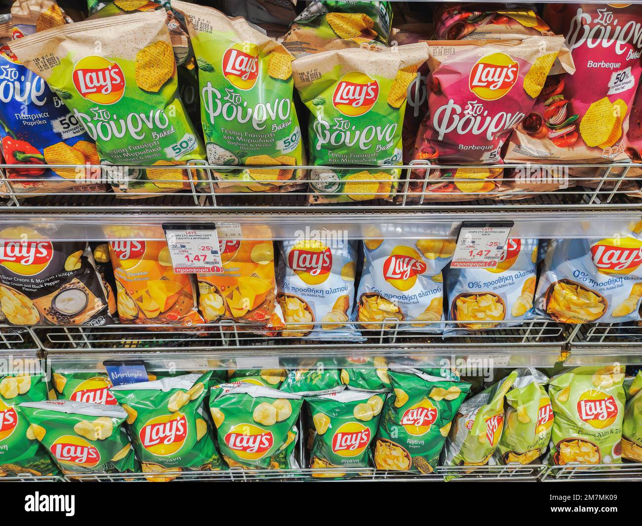Lays Potato chips on sale at the supermarket. Store interior with