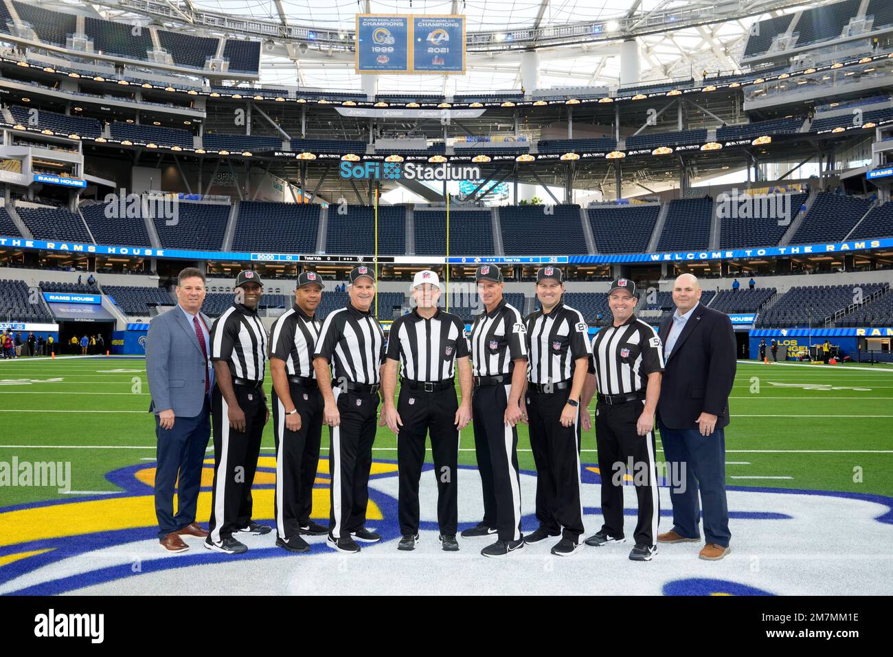 Officials pose before an NFL football game between the Los Angeles Rams and  the Las Vegas Raiders, Thursday, Dec. 8, 2022, in Inglewood, Calif. They  are, from left, replay official Bob Hubbell