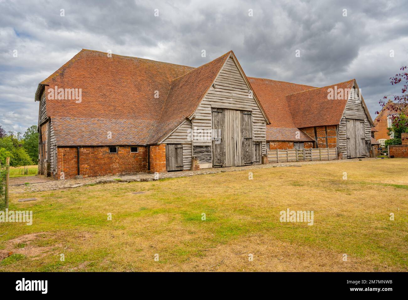 Leigh Court Barn at Leigh near Worcester, Worcestershire. one of the oldest cruck framed barns in Britain. Stock Photo