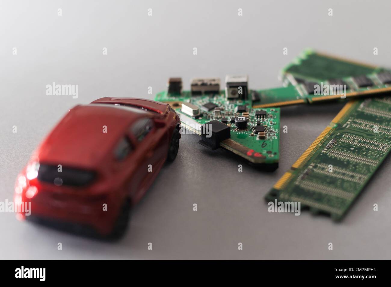 CPU chip and semiconductors with car toy. Global car chip shortage