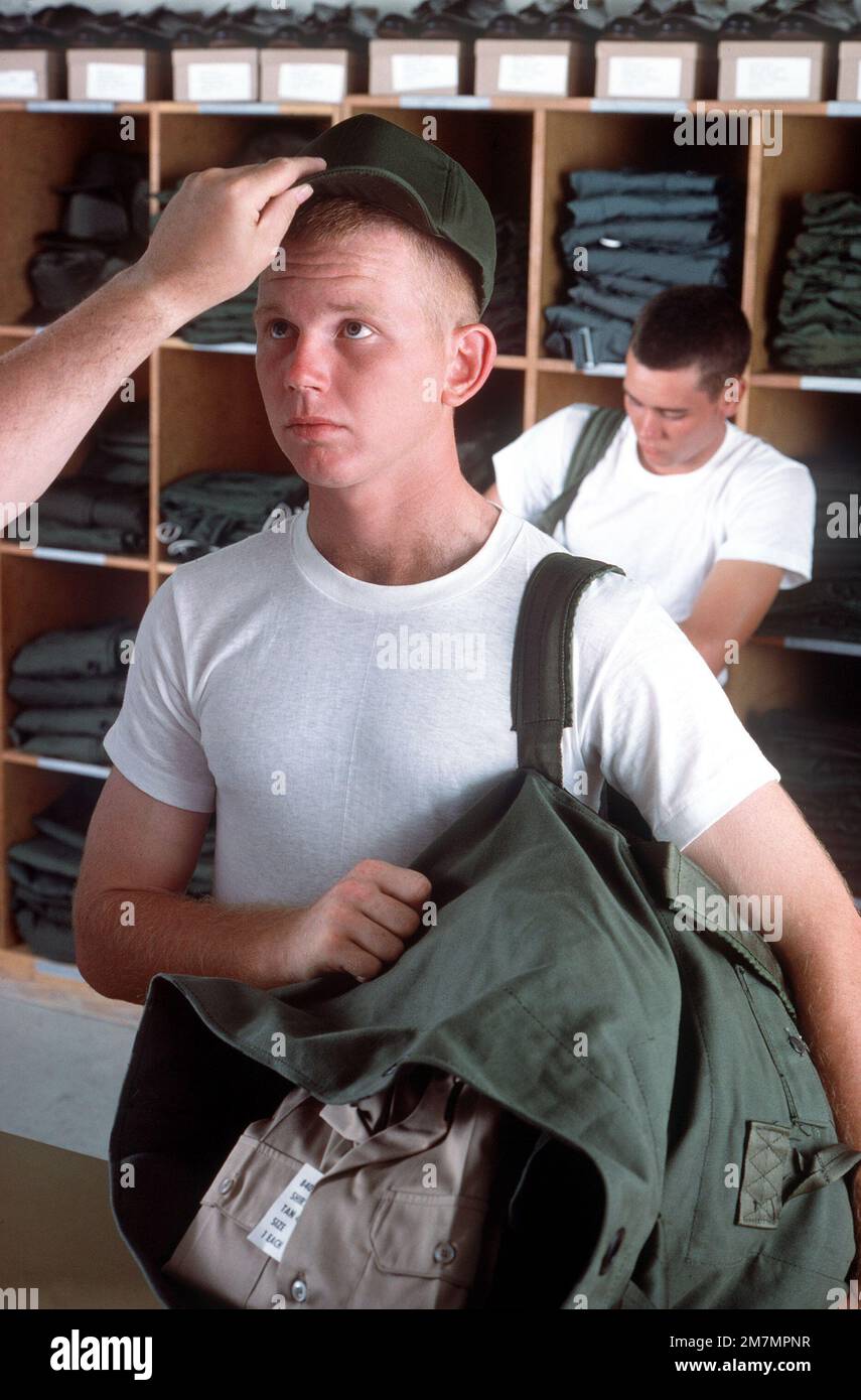 A U.S. Army recruit receives his clothing allowance during basic