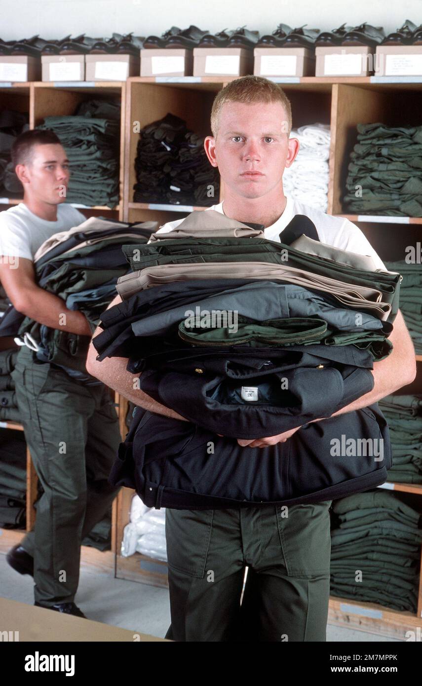 A U.S. Army recruit receives his clothing allowance during basic