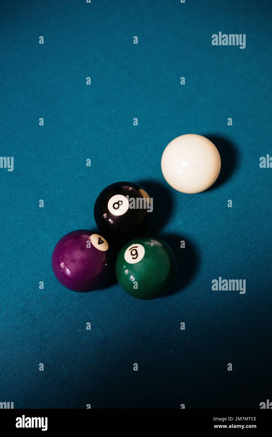 Four billiard balls on a billiard table Stock Photo - Alamy