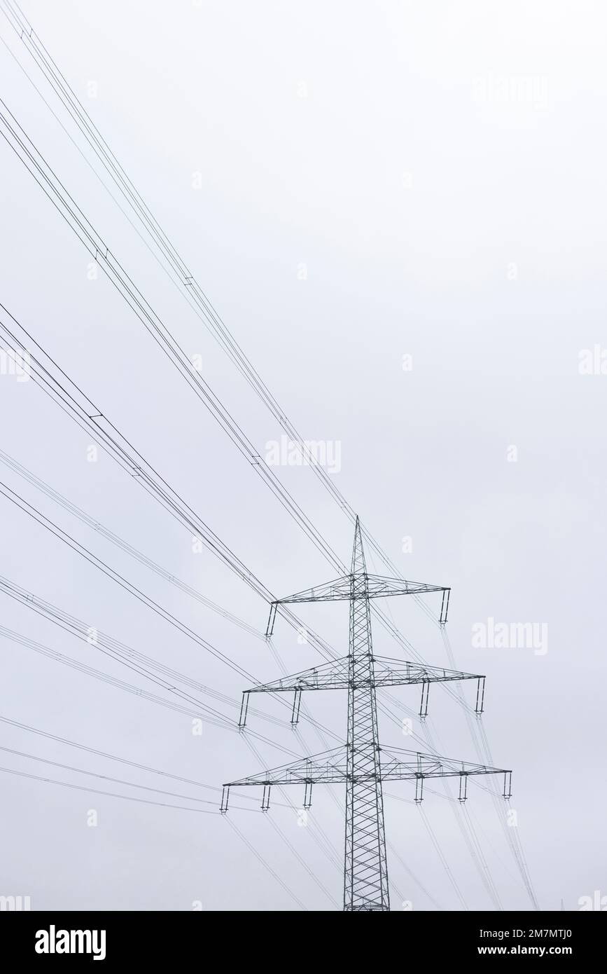Detail view of overhead power line, power supply in Germany Stock Photo