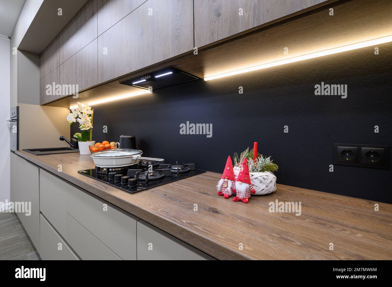Trendy grey modern kitchen interior with minimalistic furniture Stock ...