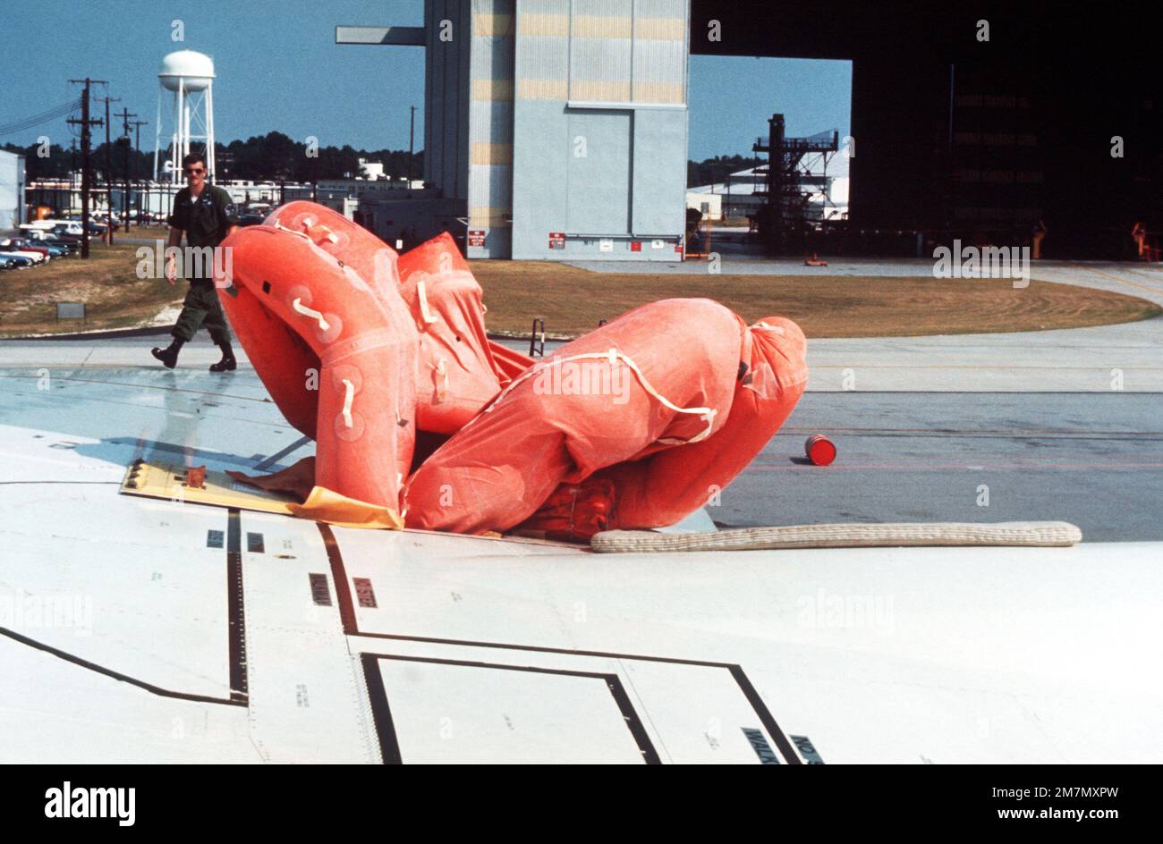 Dover Life Raft A life raft automatically inflates from the wing of an aircraft during ...
