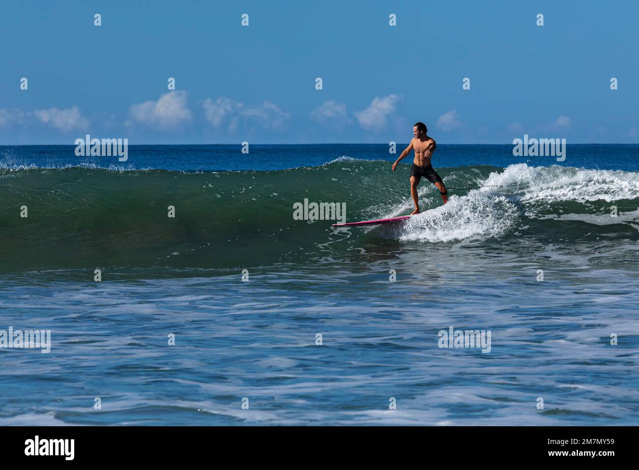 Surfer at Playa Santa Teresa, Nicoya Peninsula, Guanacaste, Costa Rica, Central America Stock Photo