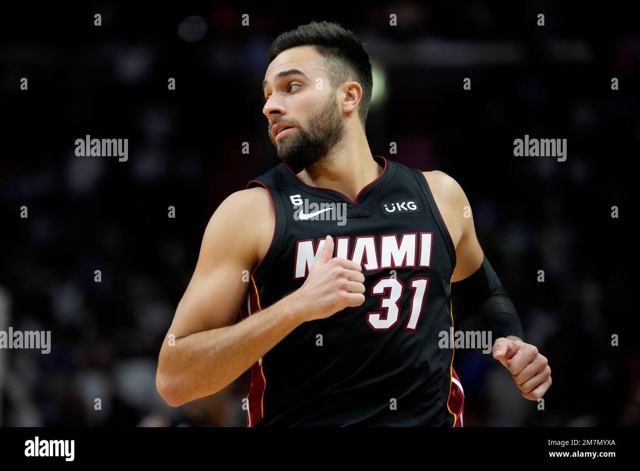 Miami Heat guard Max Strus (31) goes down the court during the second half  of an NBA basketball game against the Detroit Pistons, Tuesday, Dec. 6,  2022, in Miami. The Pistons won