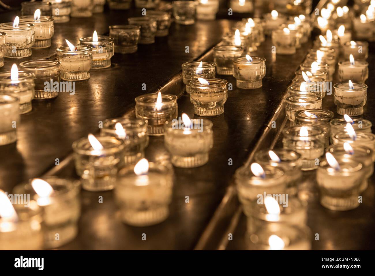 Memorial candles, advent, offering candles in a church Stock Photo Alamy
