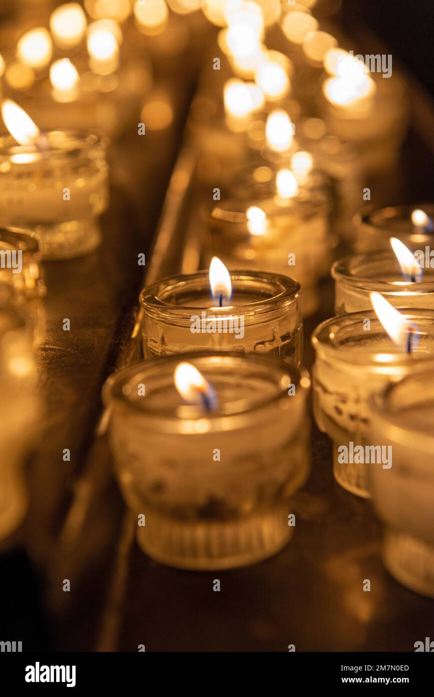Memorial candles, advent, offering candles in a church Stock Photo Alamy