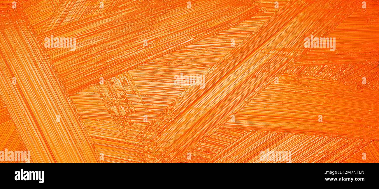 Orange paint graphic brush strokes texture background Stock Photo