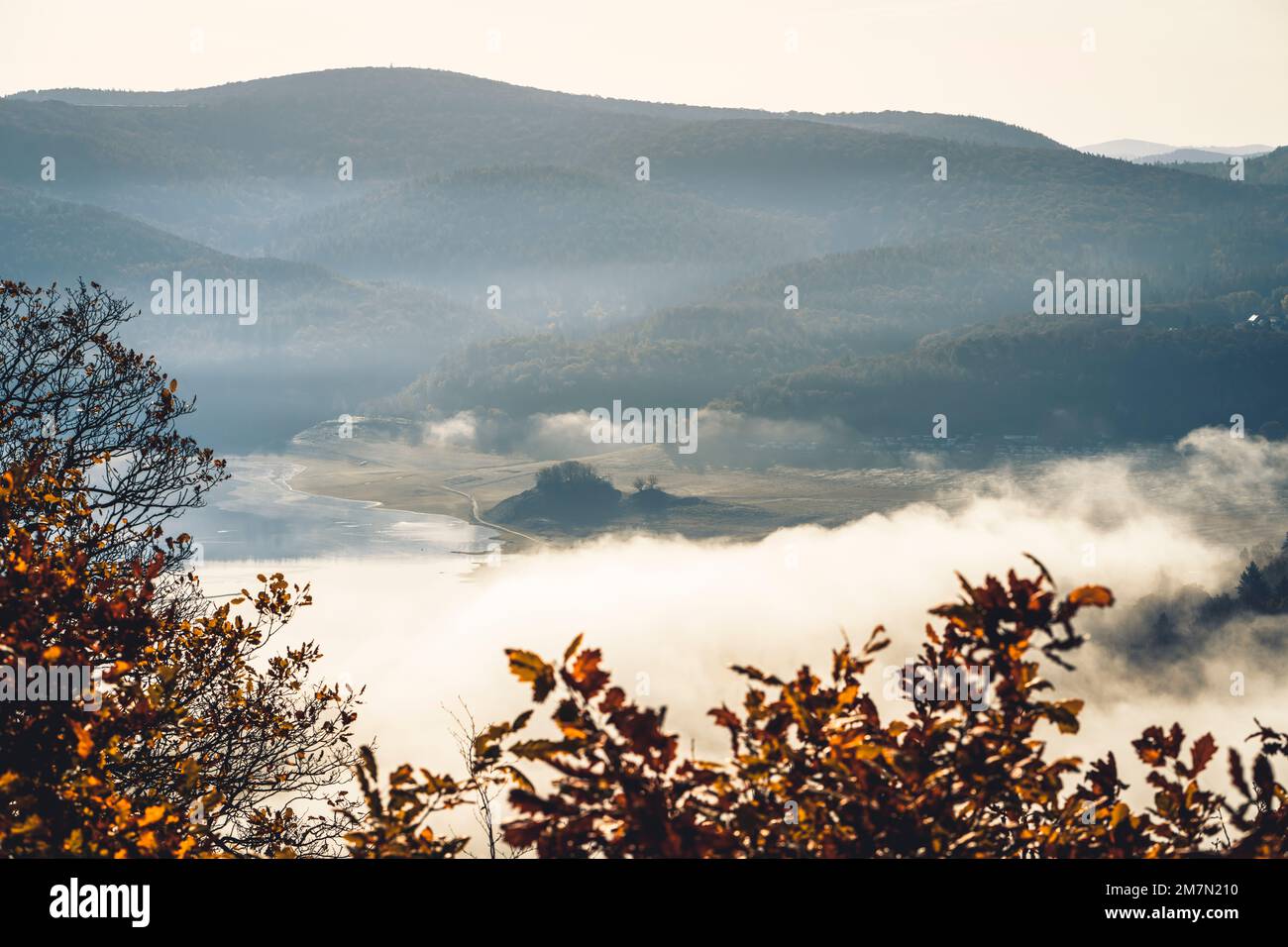 Inversion weather over the Edersee in northern Hesse in the Kellerwald-Edersee National Park on an autumn morning, view of the cloudy lake Stock Photo