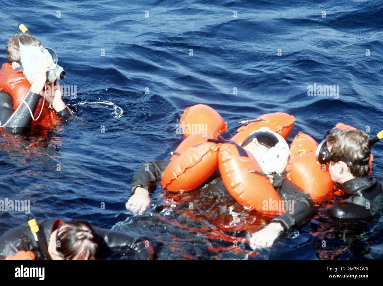 Survivors Rescued A cameraman films the rescue of a
