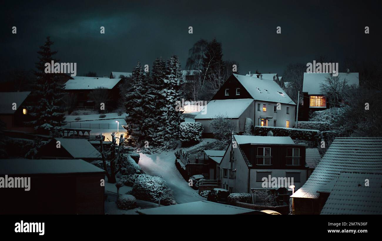 Village winter landscape in the darkness Stock Photo - Alamy