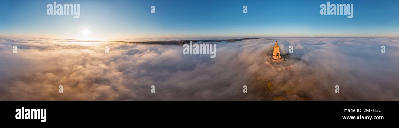 Germany, Thuringia, Bad Frankenhausen, Kyffhäuser monument rises from a sea of clouds, overview, morning light, aerial view, 36ö° panorama photo Stock Photo