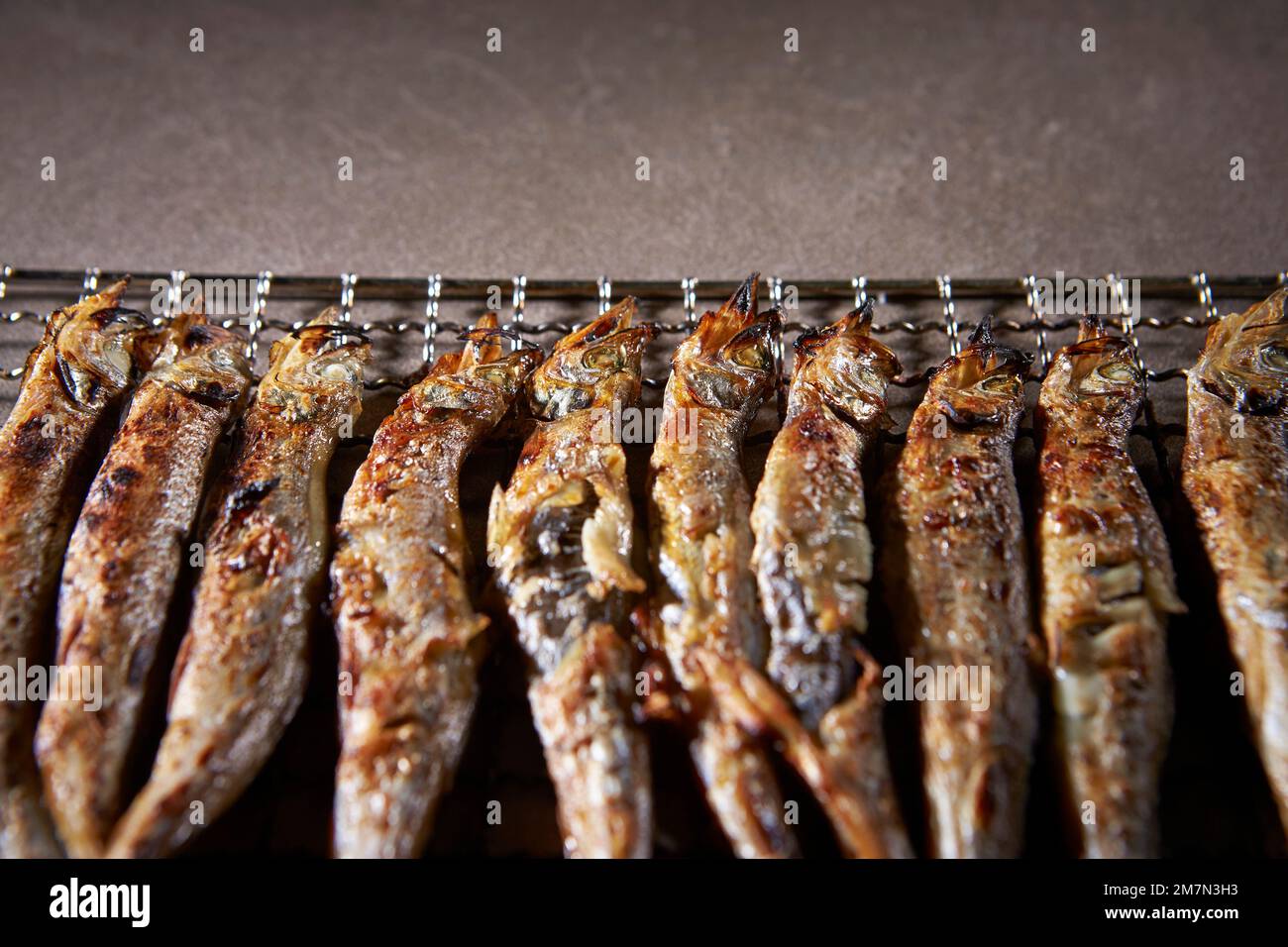 grilled fish on the grill Stock Photo - Alamy
