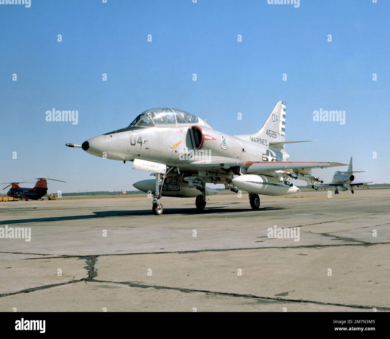 Left front view of a Marine TA-4F Skyhawk aircraft preparing to taxi from the flight line. The TA-4F is from the Headquarters and Maintenance Squadron-32. Base: Mcas, Cherry Point State: North Carolina (NC) Country: United States Of America (USA) Stock Photo