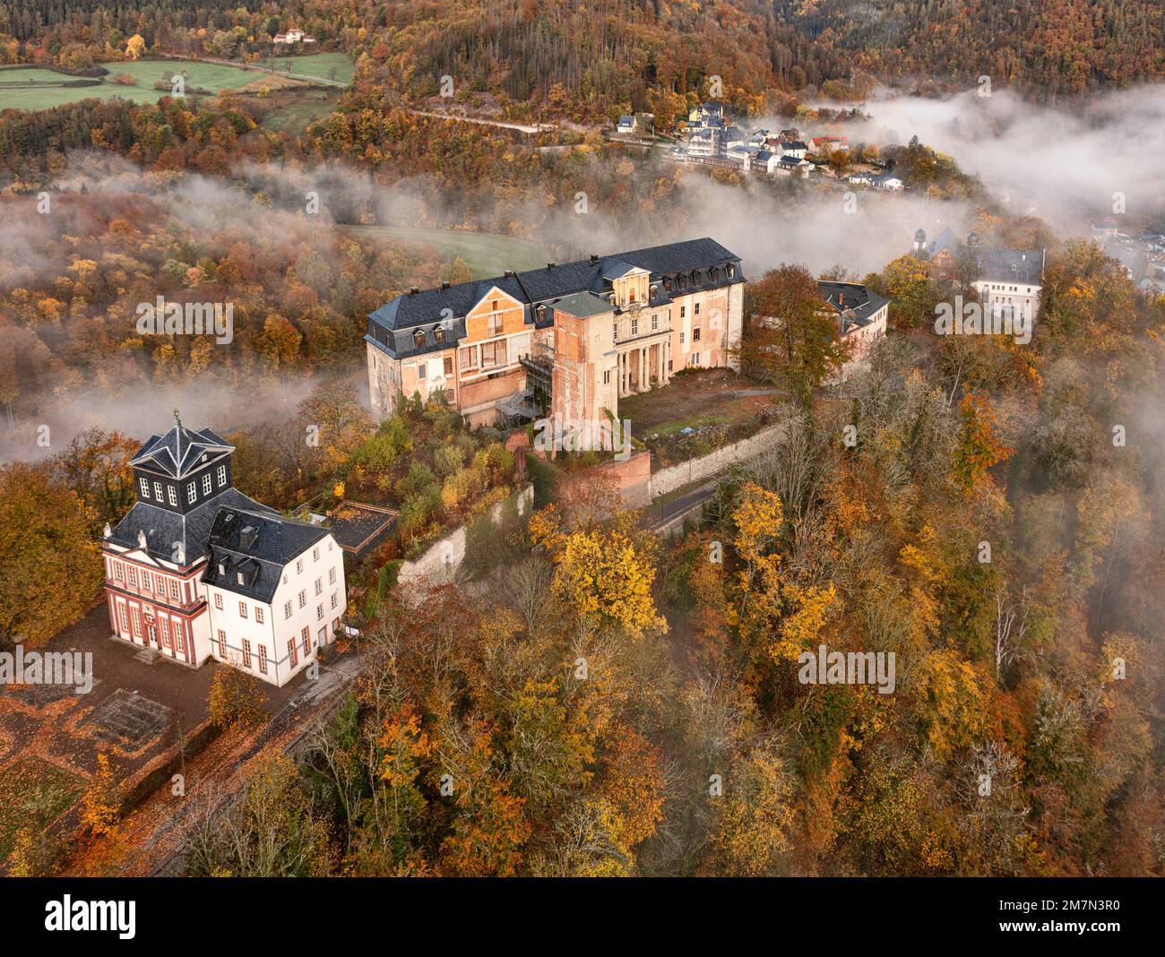 Germany, Thuringia, Schwarzburg, castle, imperial hall (foreground), armory (background), forest, houses, oblique view, aerial view Stock Photo
