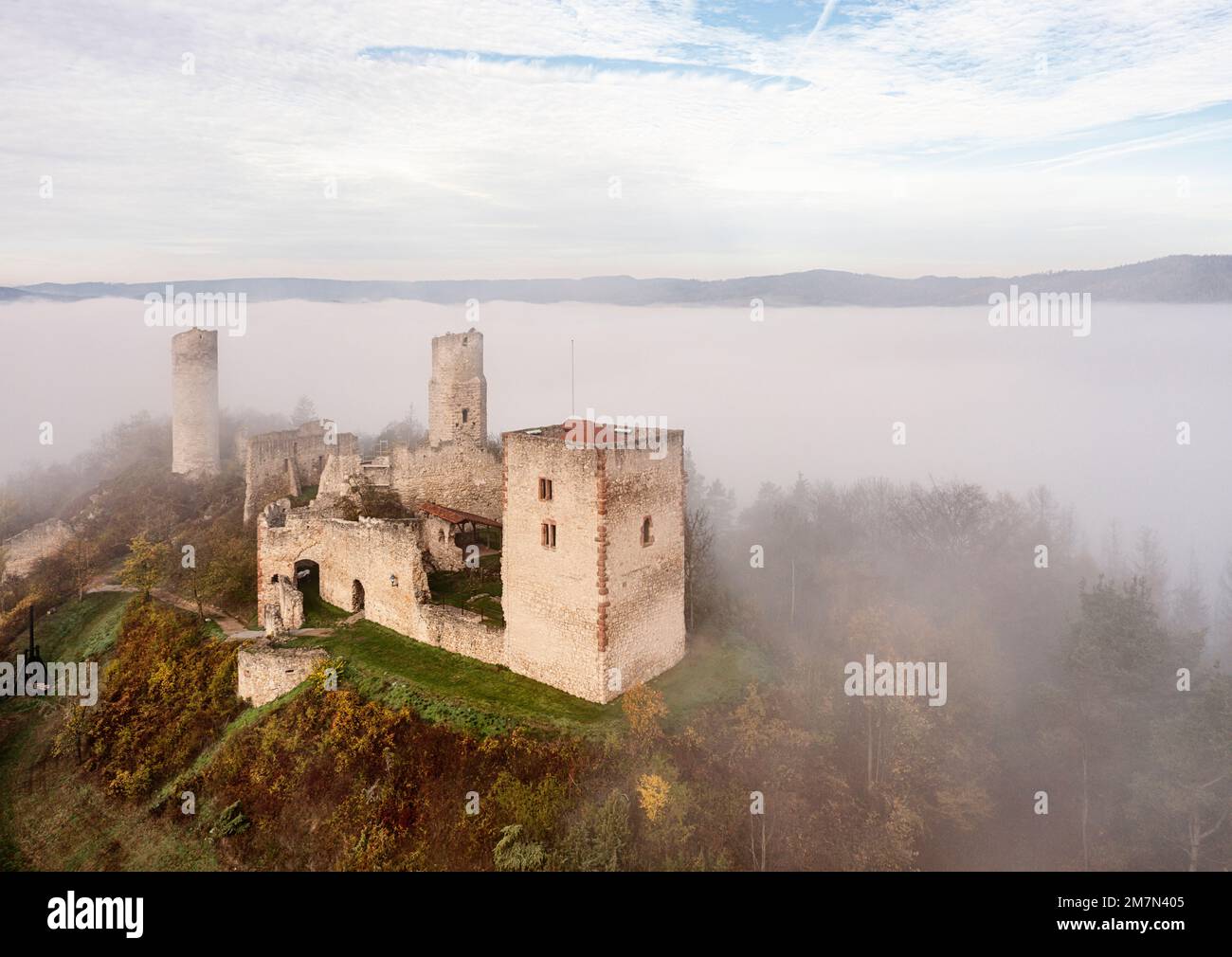 Germany, Thuringia, Gerstungen, Lauchröden, Brandenburg castle ruin and mountains rise from the valley mist, overview Stock Photo