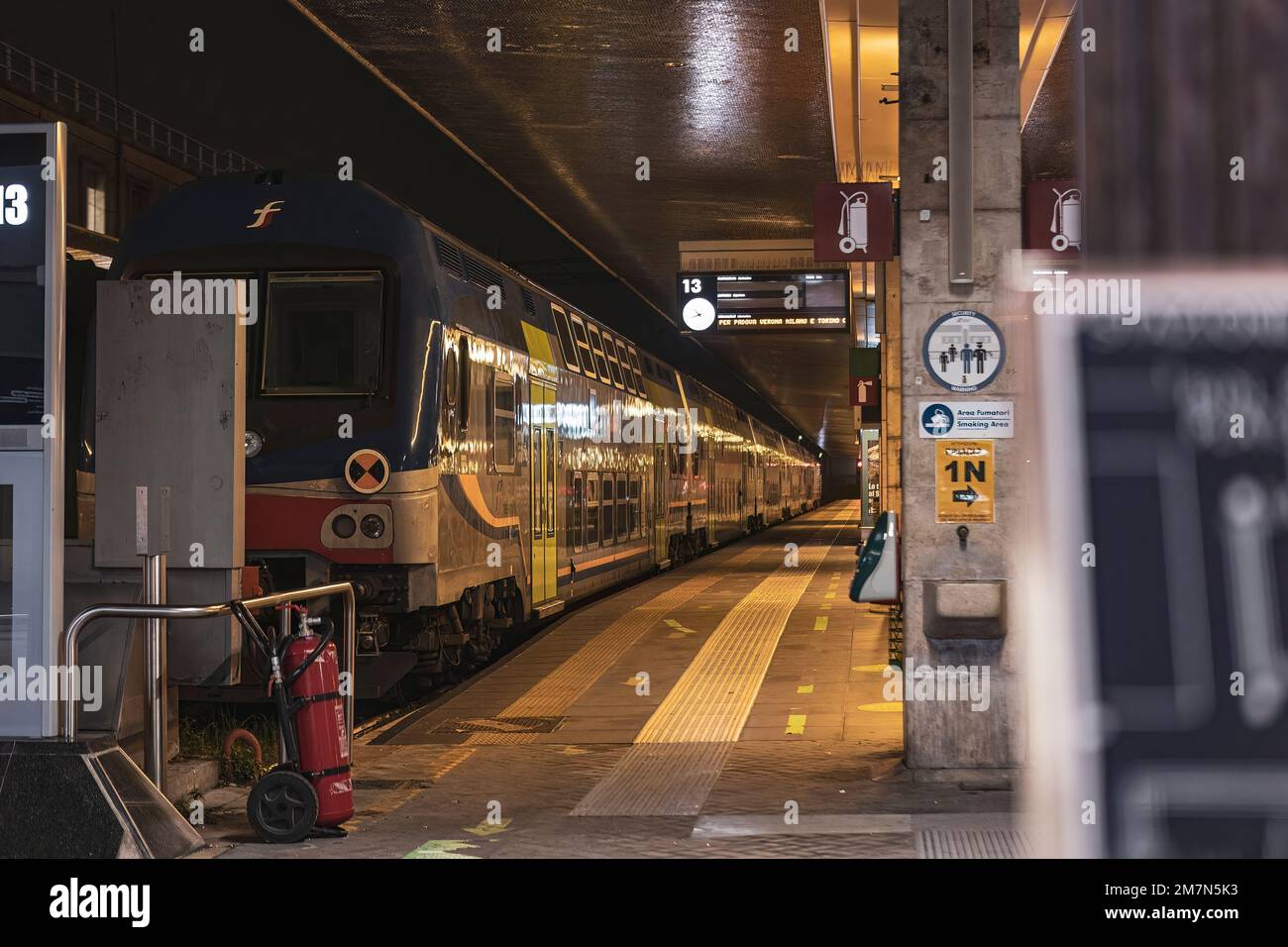 Venice, Italy 6 January 2023: Train in Railway station at night Stock Photo