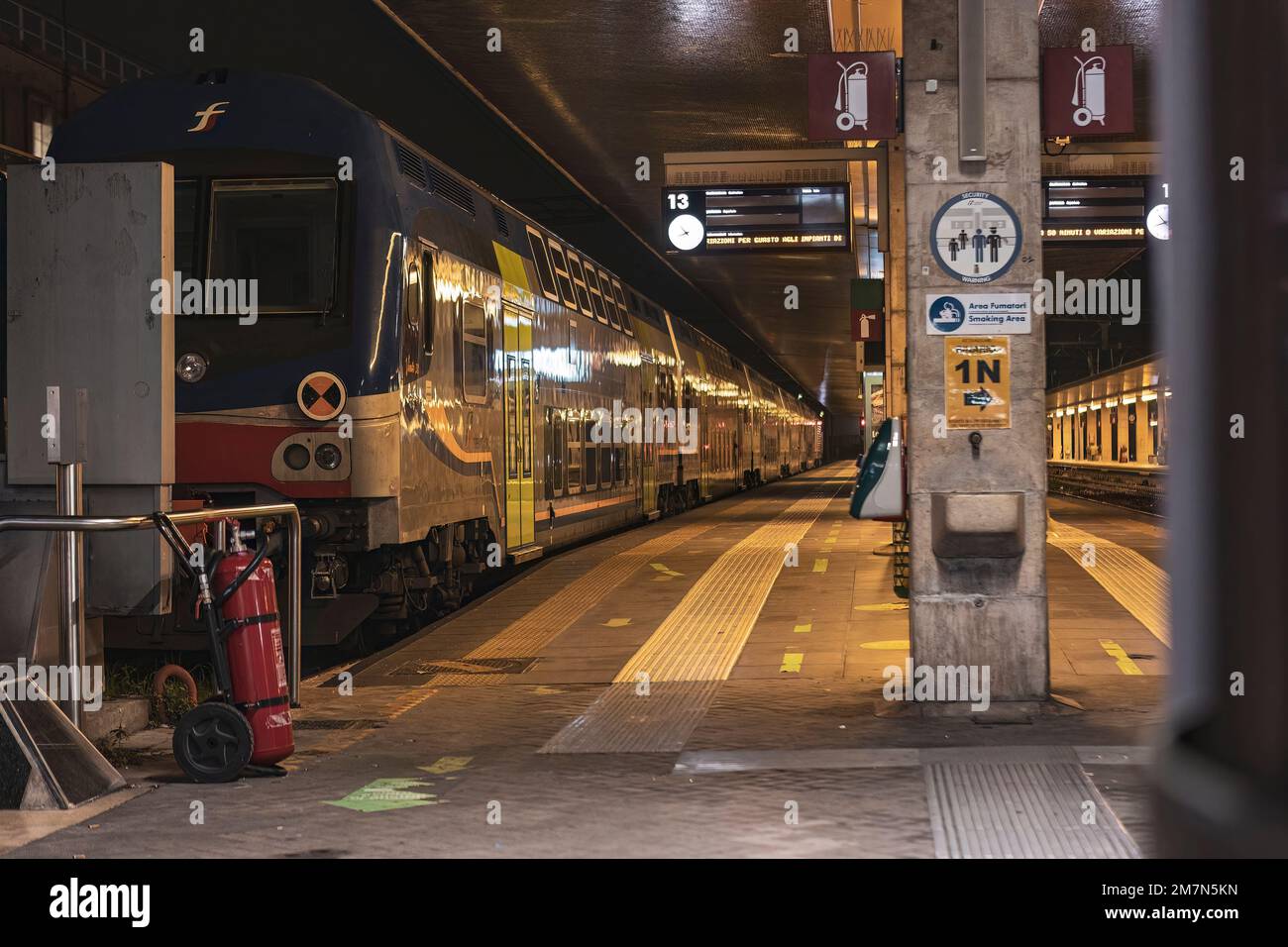 Venice, Italy 6 January 2023: Train in Railway station at night Stock Photo