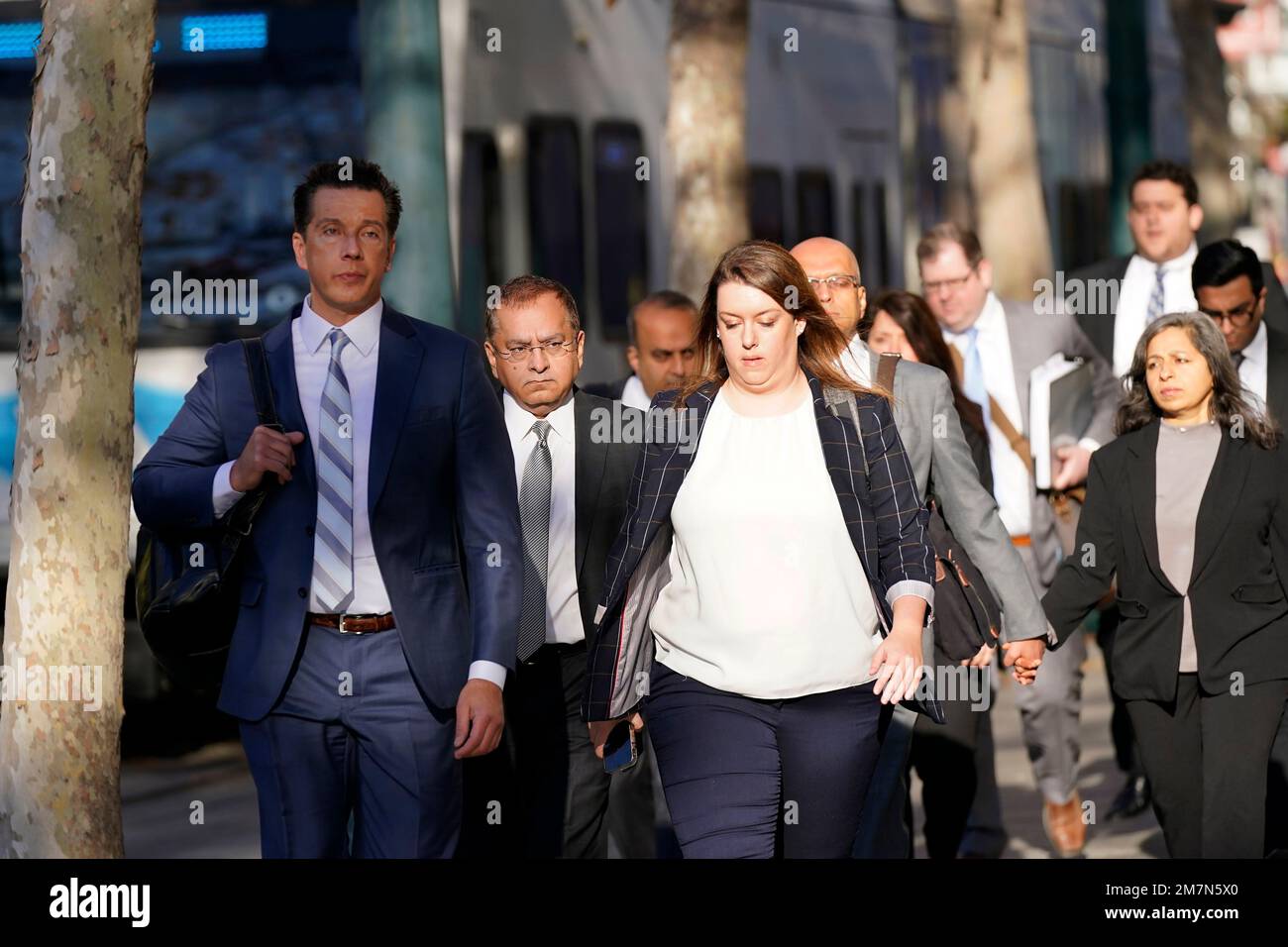 Ramesh "Sunny" Balwani, second from left, the former lover and business