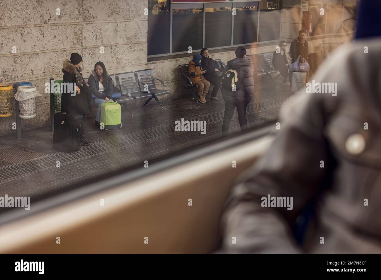 Venice, Italy 6 January 2023: travellers in train station scene Stock Photo