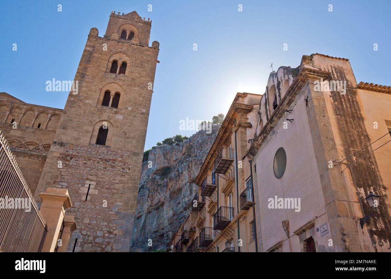 of a tower of the cathedral in Cefalu with the opposite church Chiesa Santissimo Stock Photo