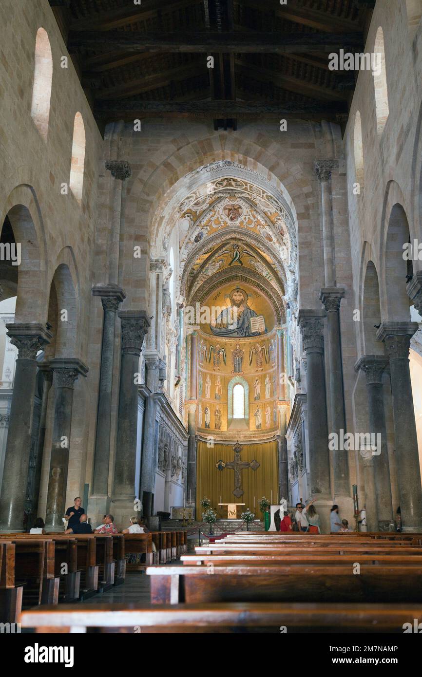 View into the nave with main altar of the cathedral in Cefalu, Sicily Stock Photo