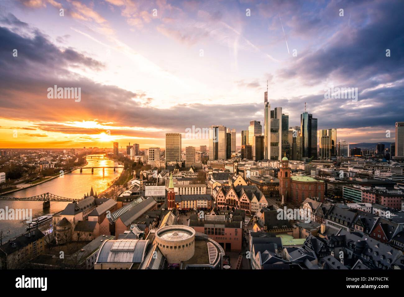 The Main river with Frankfurt skyline in the evening, at sunset. Beautiful overview of the city and its surroundings. in a special color tone, Frankfurt am Main, Hesse, Germany Stock Photo